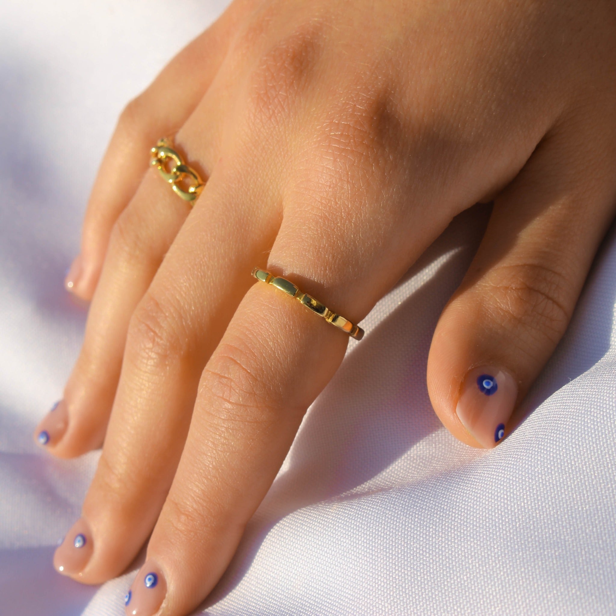 Anillo Line Acero Dorado – Acento Joyas